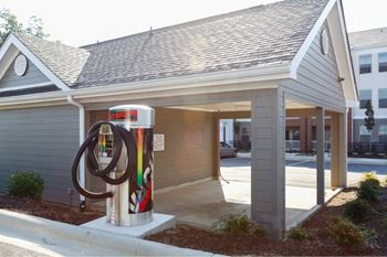 Car care center with car wash